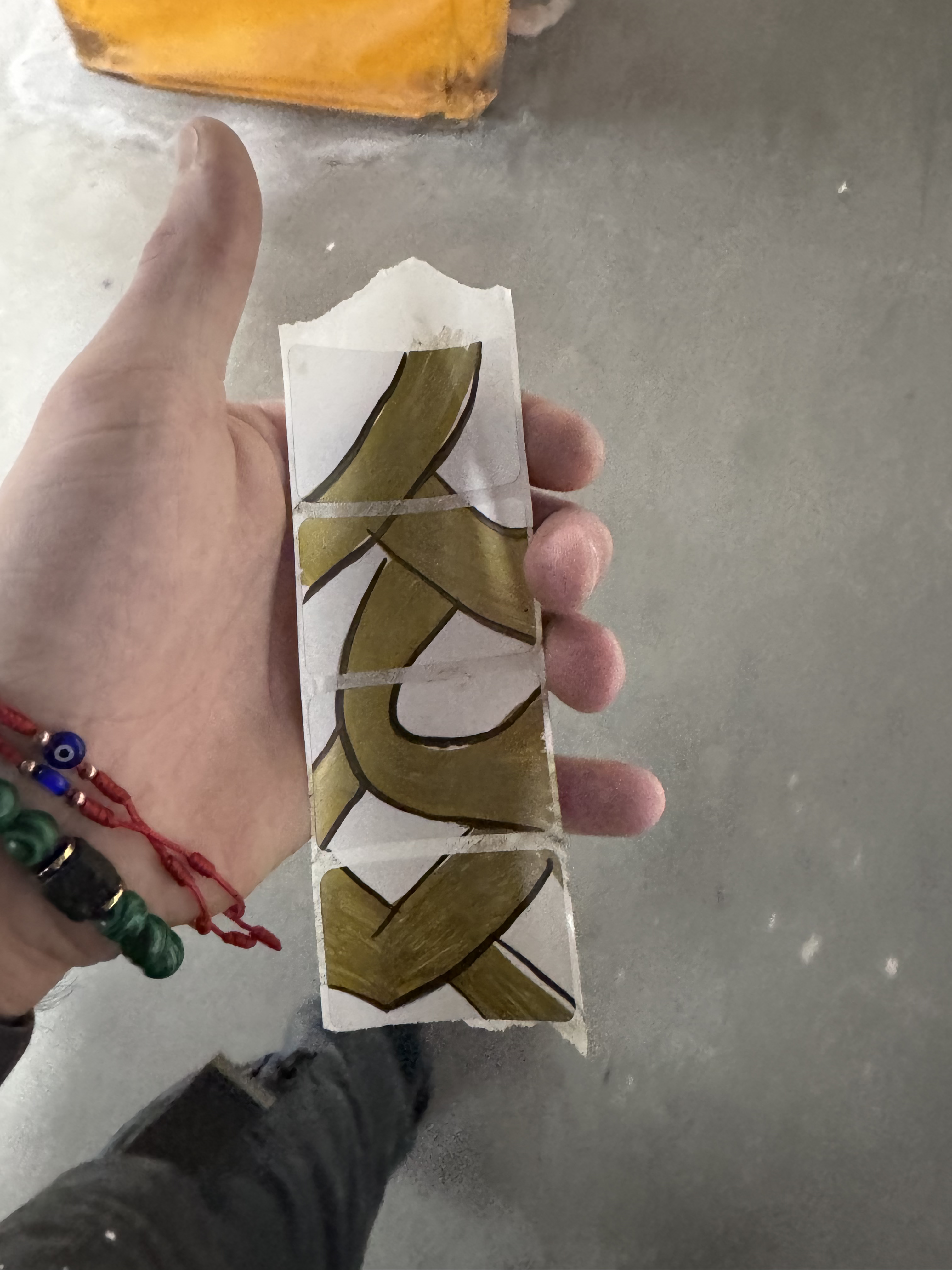 Gold Strip in Hand
